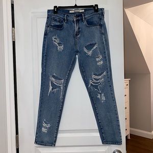 DISTRESSED DENIM JEANS